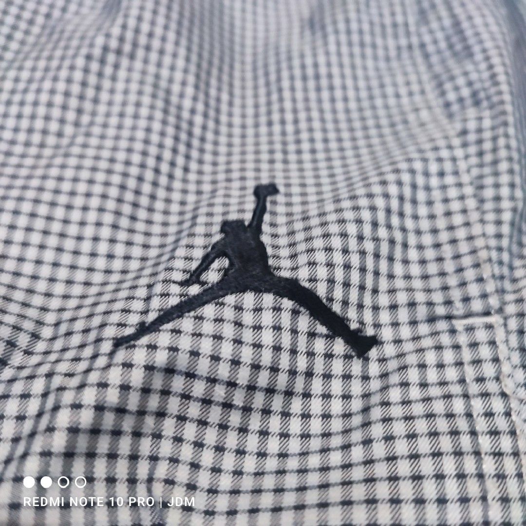Jordan Check Pattern Windbreaker Jacket (Category: Coats, Jackets and Outerwear) located in Antipolo. Submitted by klashnikov (Listing ID 1469245347, Image 3). Description: Jordan Windbreaker jacket Size:XL Dimes:25.5x30 Tags:Intact Condition:Good condition Honest issue:used/pinhole last pic,d masyado halata dahil aa dwsign at maliit lang Payment option:Bank transfer,gcash,cash ₱700 only Pwede videocall for legitimacy Pwede pickup sa aking muntin