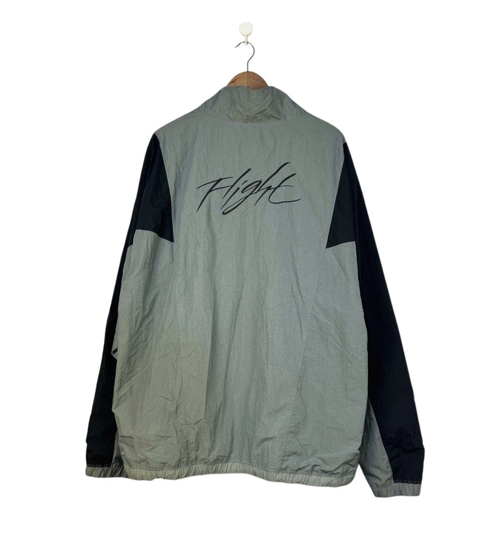 Jordan Flight Track Jacket Grey Black XXL (Category: Coats, Jackets and Outerwear) located in Caloocan City. Submitted by mzcollection_349 (Listing ID 1469245280, Image 2). Description: - Brand: Jordan Flight - Colorway: Grey and Black - Size: XXL (Measures approx. 27" x 30" inches) - Fit: Loose fit style - Details: Full zip front, side zipper pockets - Branding: Embroidered Jumpman logo on front, large printed Flight script on back - Origin: Mad