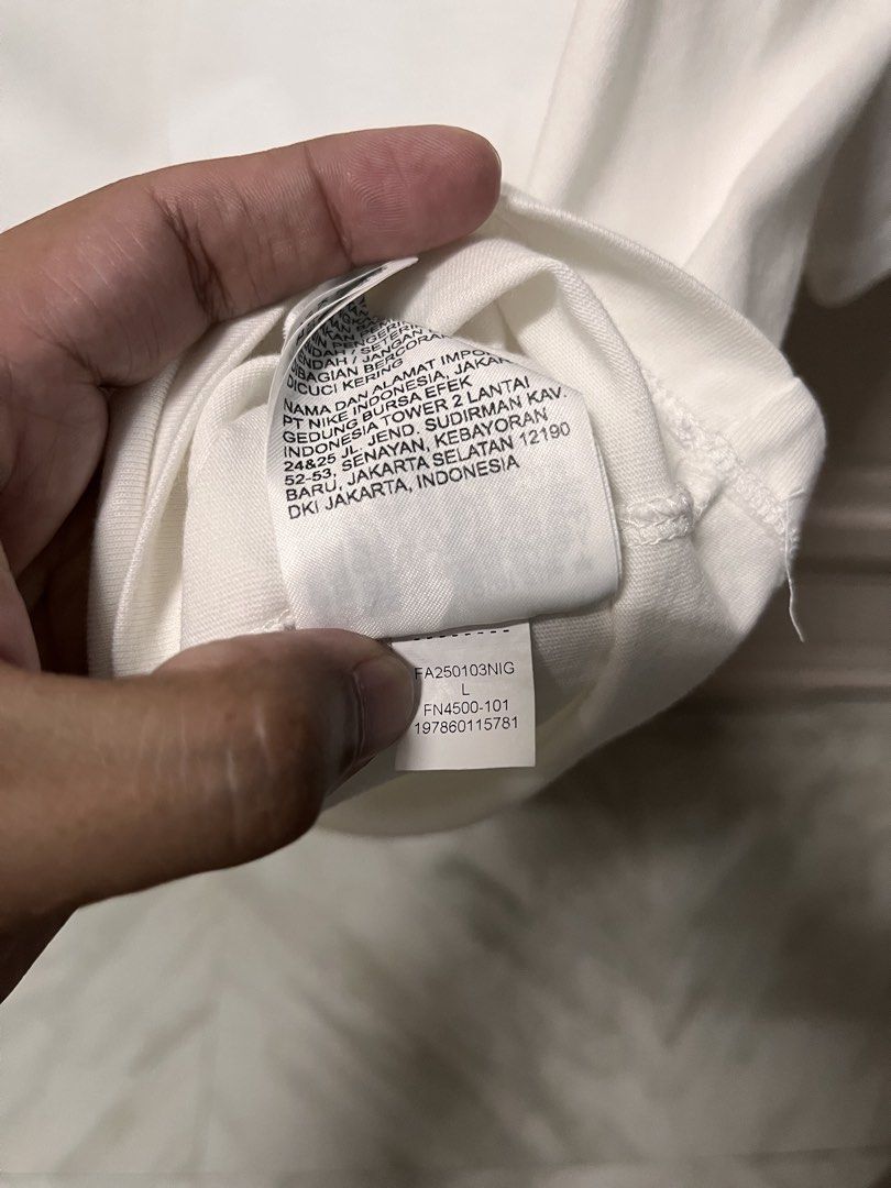 Jordan White T-Shirt Size L (Category: Tshirts & Polo Shirts ) located in Meycauayan. Submitted by ranastridran (Listing ID 1469262744, Image 3). Description: - Brand: Jordan - Color: Classic White - Size: L (Tag on inner collar) - Design: Small embroidered Jumpman logo on left chest - Fit/Style: Short sleeves, crew neckline - Condition: Clean fabric, no stains, no holes - Origin: Made in China.