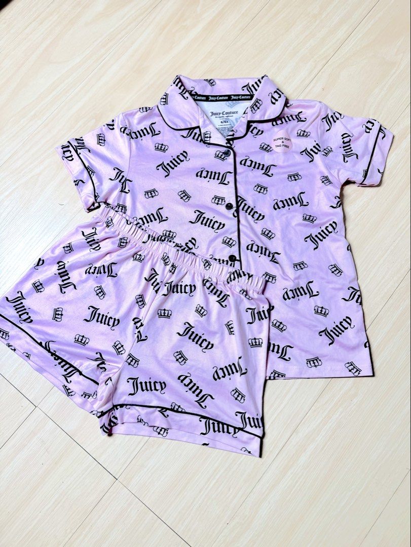 Juicy Couture Notch-Collar Pajama Set (Category: Sets or Coordinates) located in Manila. Submitted by thriftz2.spaze (Listing ID 1469351122, Image 1). Description: Xs-S short-sleeve button-up top and matching elastic-waist sleep shorts.