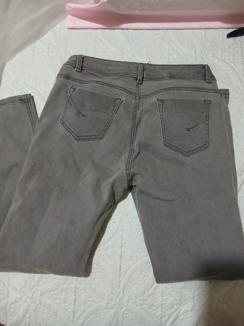 Just G Grey Jeans Size 36 (Category: Jeans) located in Cainta. Submitted by chickennuggirl (Listing ID 1469380161, Image 3). Description: - Brand/Style: Just G grey denim jeans - Size: 36 - Fit: Standard fit through the leg - Design: Classic five-pocket style with button closure and belt loops - Color: Neutral solid grey wash, easy to style with any top or shoes - Condition: Excellent, ready to wear.