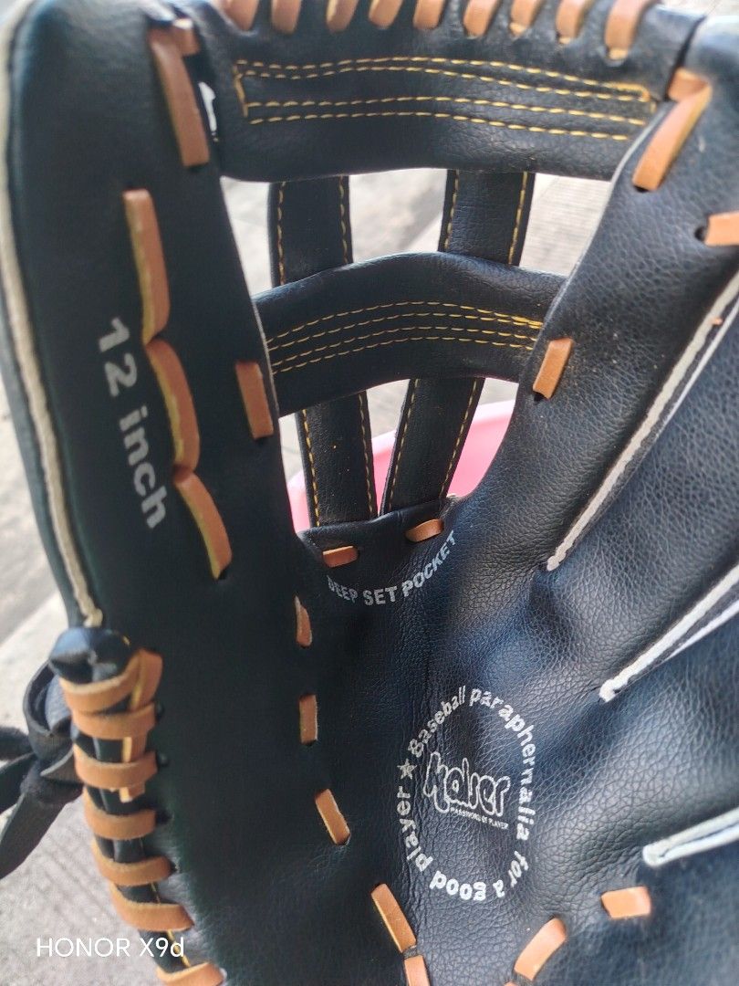 Kaiser 12 Inch Baseball Glove (Category: Racket and Ball Sports) located in Manila. Submitted by mightypenguin_44c1b5 (Listing ID 1469213441, Image 1). Description: - Brand: Kaiser - Size: 12 inches - Color: Black with contrasting tan lacing and yellow stitching - Design: Professional model with a deep set pocket for secure catches - Comfort: Features a soft palm lining for added comfort - Best for: Practice sessions and casual games - Condition: