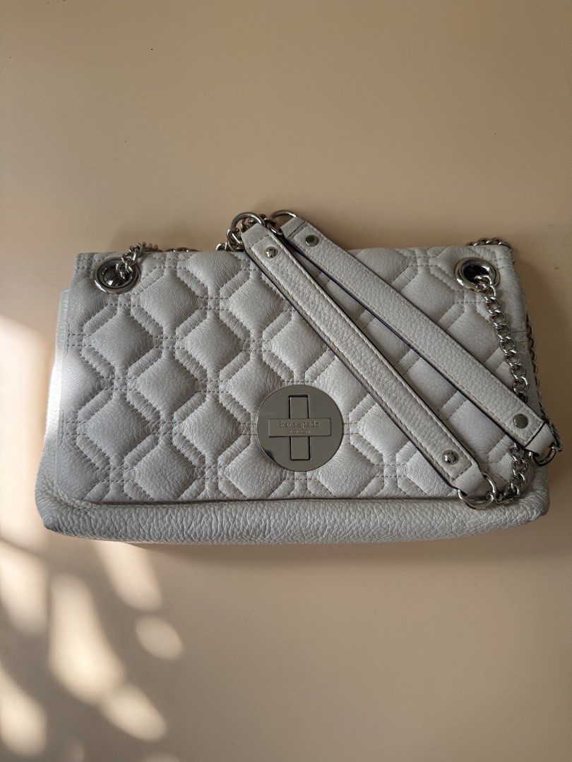 Kate Spade Astor Court Shoulder Bag (Category: Luxury Bags & Wallets) located in Pasig City. Submitted by bitofahoarder (Listing ID 1469166459, Image 3). Description: - Kate Spade Astor Court Naomi shoulder bag in Bone - Can be worn as a shoulder bag or a sling bag - Condition: Used with minimal signs of use, slight scuffing on the bottom edges, handles and hardware in pristine condition - Inclusions: Original dust bag and care card Purchased in 
