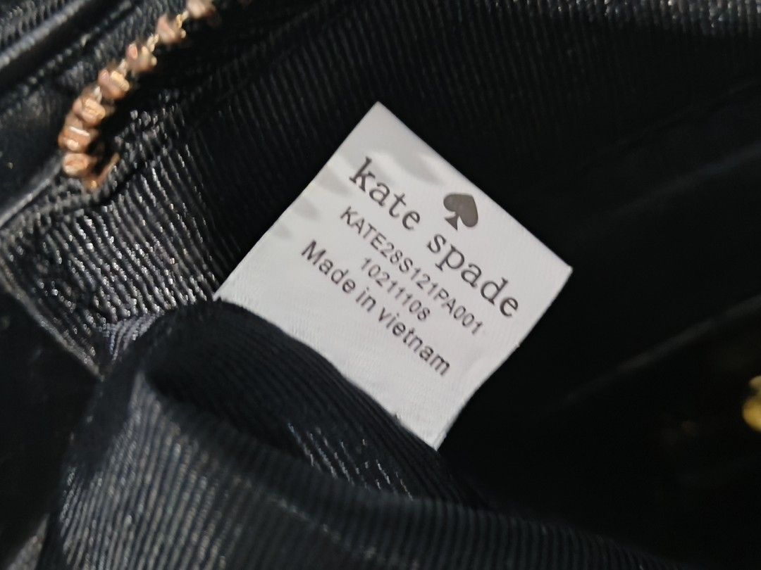 Kate Spade Black Nylon Shoulder Bag (Category: Luxury Bags & Wallets) located in Manila. Submitted by _cee02 (Listing ID 1469250578, Image 3). Description: - Brand: Kate Spade New York - Color/Material: Black nylon with gold-tone hardware - Closure: Secure top zipper - Features: Sturdy black shoulder straps, clean everyday silhouette - Interior: Includes style number tag (KATE28S121PA001) - Origin: Made in Vietnam - Condition: Excellent daily wea