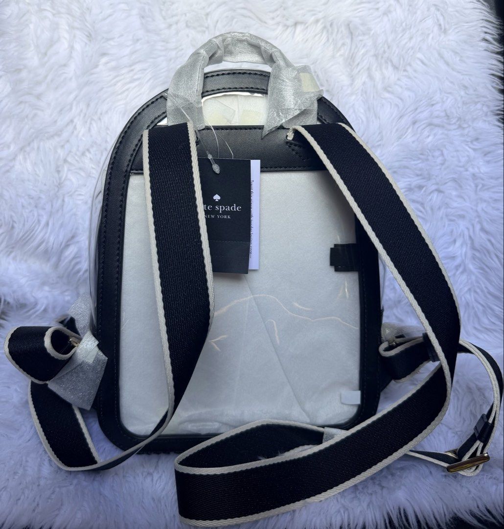 Kate Spade Claire See-Through Raining Dot Print Medium Backpack (Category: Backpacks) located in Rizal. Submitted by gannda (Listing ID 1469241491, Image 3). Description: - Brand: Kate Spade - Style: Claire See-Through Raining Dot Print Medium Backpack - Color: sBlack and White - Condition: Brand new with original tags attached and protective wrapping on hardware/handles - Material: Clear vinyl body with polka dot front pouch - Features: Adjustab