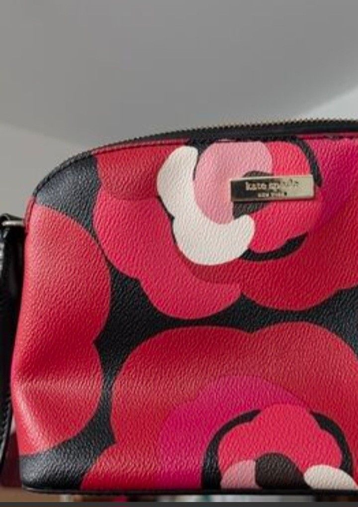 Kate Spade Printed Mini Dome Shoulder / Crossbody Bag (Category: Luxury Bags & Wallets) located in Navotas City. Submitted by ms.soulana (Listing ID 1469202189, Image 3). Description: PreOwmed Lightly Used Kate Spade Printed Mini dome Shoulder /Crossbody bag Small MultiColor in Red ,Pink ,black - Style: Dome Crossbody Bag - Design: Bold red, pink, and black floral print with smooth black leather trim - Hardware: Premium gold-tone - Closure: Secur