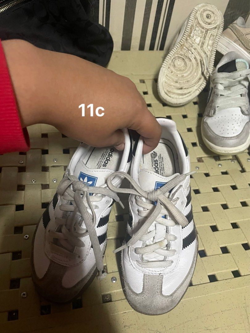 Kids sneakers bundle Nike Adidas size 11c (Category: Babies & Kids Fashion) located in Manila. Submitted by delarosaje13080 (Listing ID 1469374142, Image 2). Description: - Bundle set of 3 popular kids sneakers - Includes Nike Air Force 1, Nike Dunk Low (Silver Swoosh), and Adidas Samba - Size: 11C - Condition: Pre-loved with scuffs and dirty soles - Ideal everyday shoes for fast-growing feet .