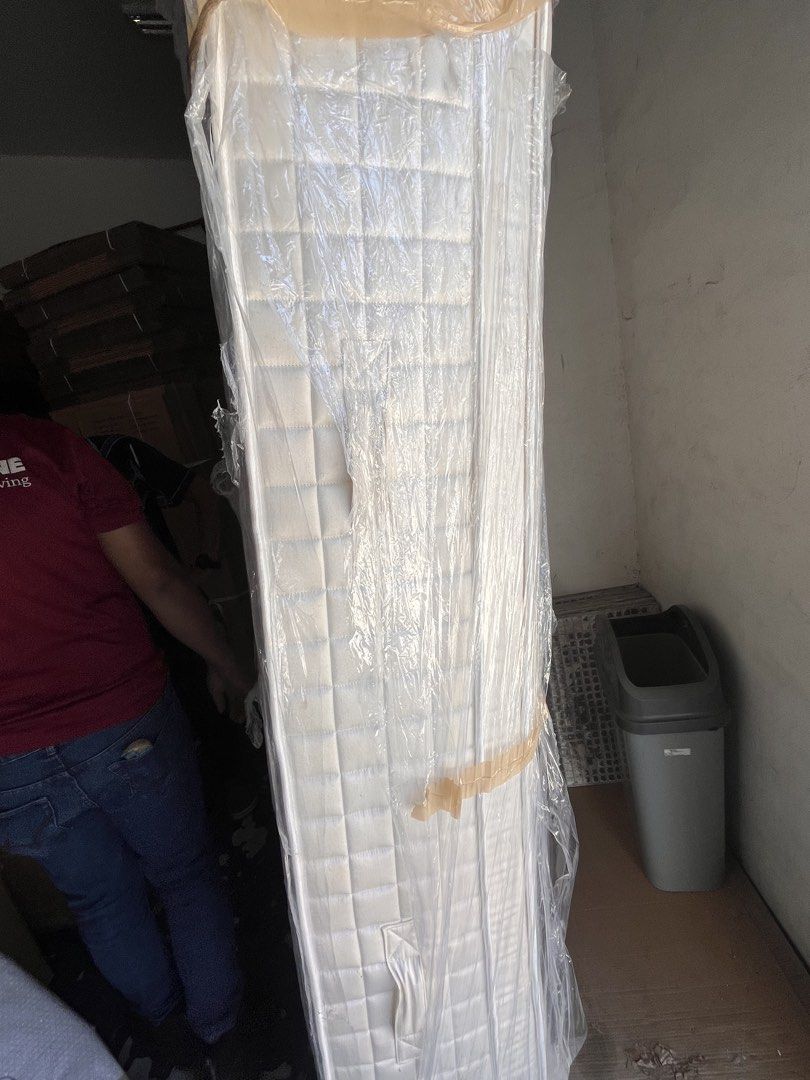 King Size Wrapped Mattress Quilted White (Category: Bed Frames & Mattresses) located in Manila. Submitted by lan_0028 (Listing ID 1469164754, Image 1). Description: - Color/Design: White with button-tufted quilted surface - Condition: Clean, wrapped in protective plastic, stored indoors - Build: Heavy duty, requires two people for transport - Status: Ready for pick up.