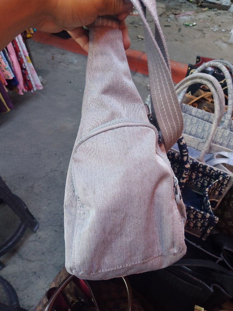 Kipling Grey Shoulder Bag Crossbody (Category: Cross-body Bags) located in Manila. Submitted by fiercedog.23d517 (Listing ID 1469163220, Image 2). Description: - Authentic Kipling shoulder bag in a stylish grey denim-look fabric - Multiple exterior zipped pockets for organized and easy storage - Secure zip top closure to keep your essentials safe - Comfortable adjustable strap for everyday wear - Interior lined with signature patterned fabric and