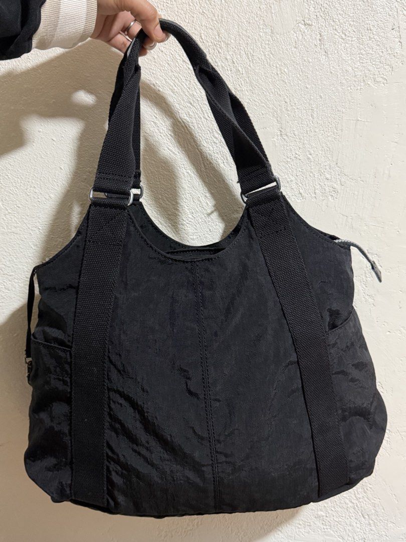 Kipling Nylon Tote (100% ORIGINAL) From Japan (Category: Shoulder Bags) located in Carmona. Submitted by vetaesencial (Listing ID 1469252561, Image 2). Description: Signs of wear / Few creasing on top handle since it has a hint of leather and due to wear YKK Zip Fits 15" laptop / Tablet Purchased from 🇯🇵 Loc: Carmona Cavite / Biñan Laguna First to pay!.