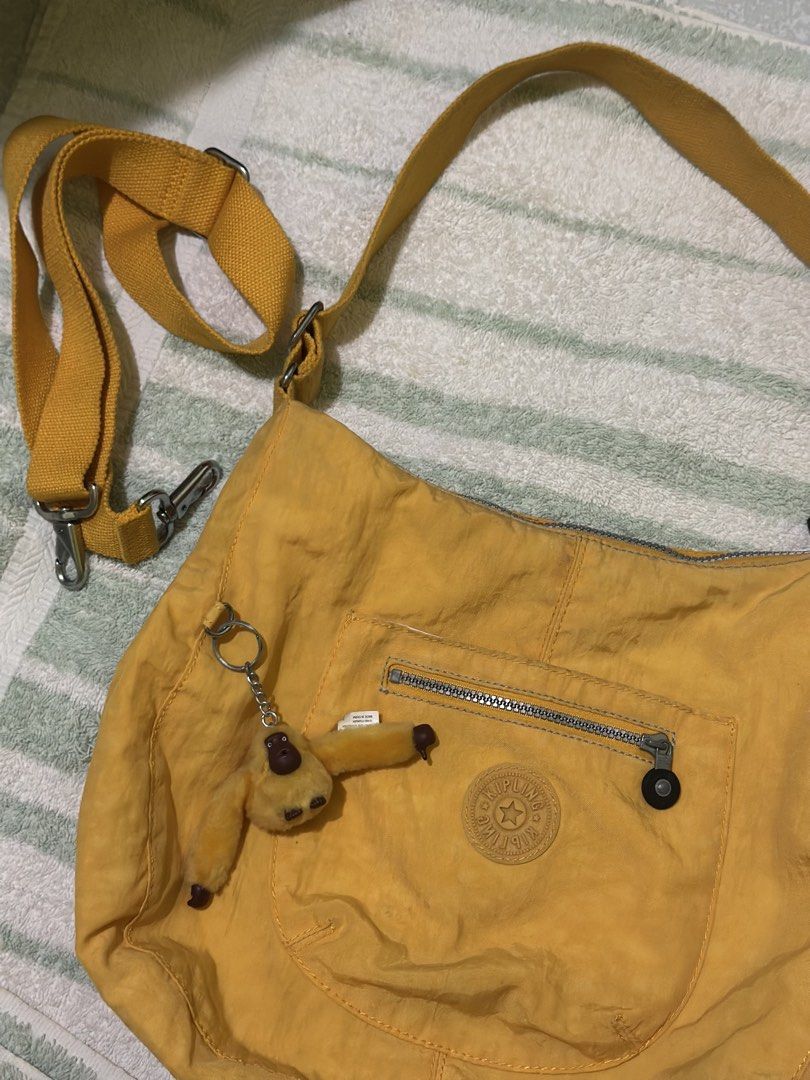 Kipling Nylon Tote Bag in Yellow (Category: Tote Bags) located in Pagsanjan. Submitted by leyuxdenini (Listing ID 1469327479, Image 3). Description: Good conditon.