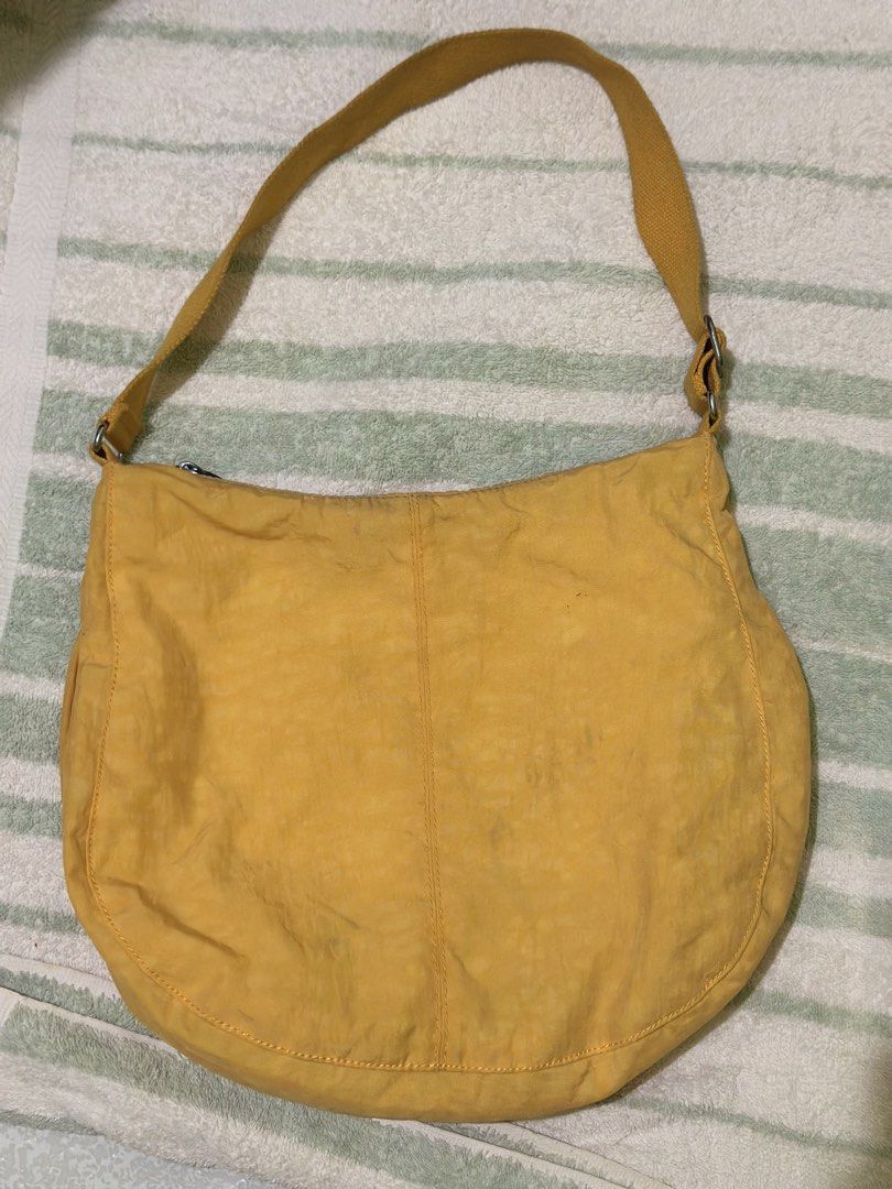 Kipling Nylon Tote Bag in Yellow (Category: Tote Bags) located in Pagsanjan. Submitted by leyuxdenini (Listing ID 1469327479, Image 2). Description: Good conditon.