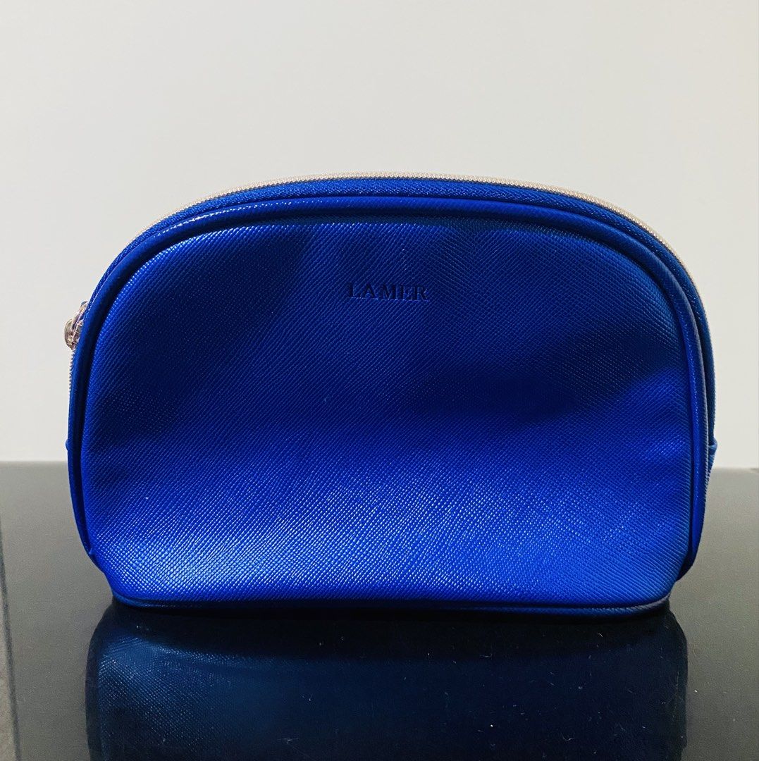 La Mer Royal Blue Shiny Pouch (Category: Purses & Pouches) located in Pasay City. Submitted by trendystash (Listing ID 1469321826, Image 1). Description: Brand new 5x7x2 inches.