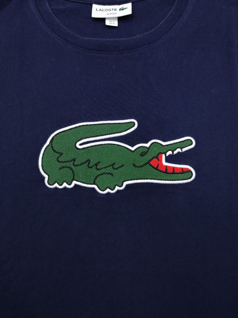 Lacoste Big Crocodile Patch Tee (Category: Luxury Apparel) located in Bulacan. Submitted by emilj23 (Listing ID 1469201026, Image 2). Description: Lacoste Big Crocodile Patch Tee Size M on tag L 27 W 19 Condition 9/10 Color rate 9/10 Issue Slight Fade Neckline,minimal white stains.