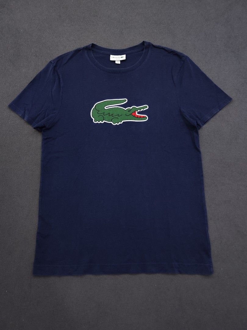 Lacoste Big Crocodile Patch Tee (Category: Luxury Apparel) located in Bulacan. Submitted by emilj23 (Listing ID 1469201026, Image 1). Description: Lacoste Big Crocodile Patch Tee Size M on tag L 27 W 19 Condition 9/10 Color rate 9/10 Issue Slight Fade Neckline,minimal white stains.