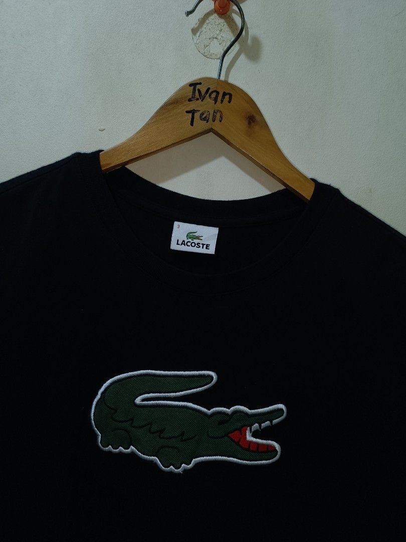 Lacoste Big Logo Shirt (Category: Tshirts & Polo Shirts ) located in Makati City. Submitted by ivsseyow03 (Listing ID 1469278946, Image 2). Description: Black short-sleeve t-shirt from Lacoste. Features a huge embroidered green crocodile logo patch right on the chest. Classic crew neck style. Size 3 (95) on the inner collar tag. 100% cotton fabric, soft feel. Interior care tags intact with model number TH6708-92. Clean fabric, no stains or damage