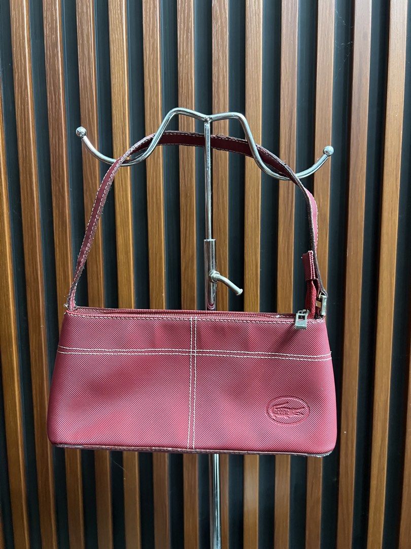 Lacoste Kili (Category: Luxury Bags & Wallets) located in Dagupan City. Submitted by nicacloset.ph (Listing ID 1469391070, Image 1). Description: rubber lining issue.