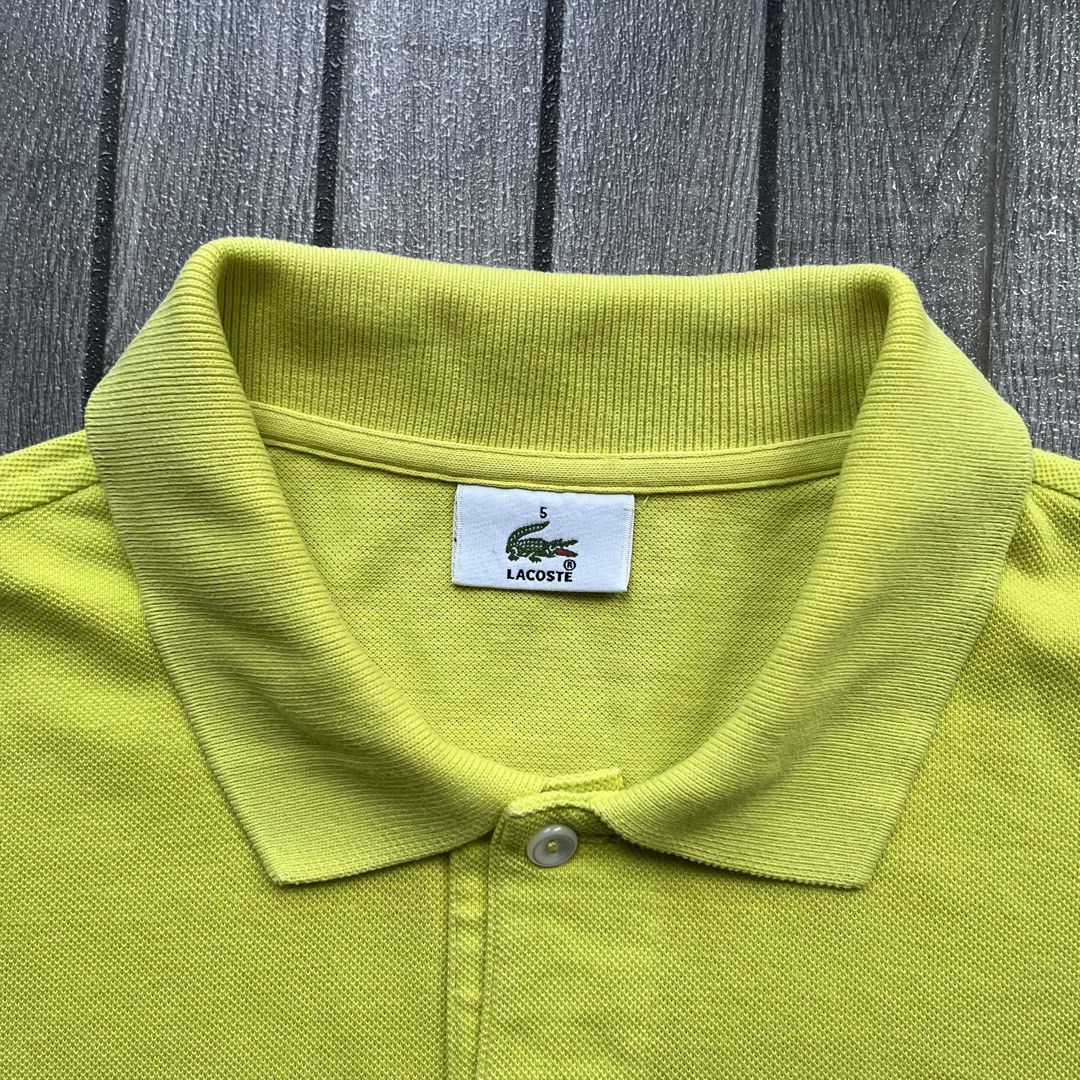 Lacoste Men’s Polo Shirt (Category: Activewear) located in Manila. Submitted by quali_thrift (Listing ID 1469320593, Image 3). Description: Lacoste Men’s Polo Shirt Color: Neon Yellow Size: 5 on tag (XL) Dimes: 23 x 28.5 Condition: 9.5/10 Color rate: 9.5/10 Authentic/Legit Excellent condition! Price: ₱1,300 + sf ✅.