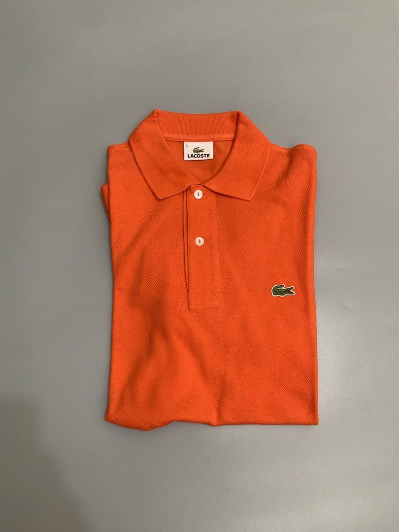 Lacoste Orange Polo Shirt (Category: Tshirts & Polo Shirts ) located in Mexico. Submitted by bugskiethrift (Listing ID 1469252876, Image 2). Description: size: 2 19x26 good as new condition bump a message for more info.