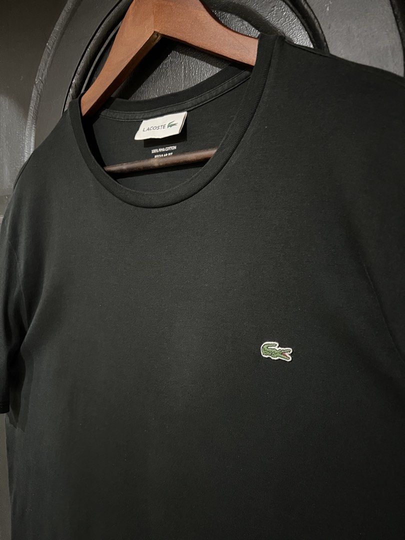 Lacoste Pima Cotton T Shirt (Category: Tshirts & Polo Shirts ) located in Manila. Submitted by meeco (Listing ID 1469329995, Image 3). Description: Lacoste Pima Cotton Regular Fit T-Shirt (TH6709) Size: XL (Regular Fit) Exact Dimension: 23x28 Color: Black Color Rate: 9/10 Condition: 9/10 Excellent Condition Personal Collection Decluttering Metro Manila Area Ship via J&T or Lalamove COD.