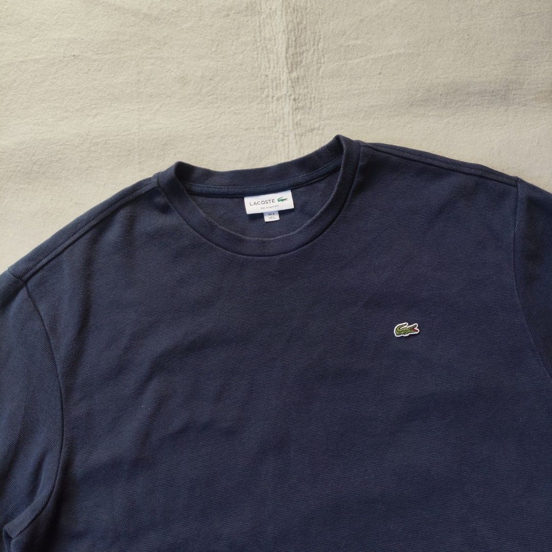 Lacoste Short Sleeve Sweatshirt (Category: Tshirts & Polo Shirts ) located in Balamban. Submitted by winston.jude (Listing ID 1469341433, Image 2). Description: large on tag width:23.5 length:28.5 good condition no issues 550+sf.