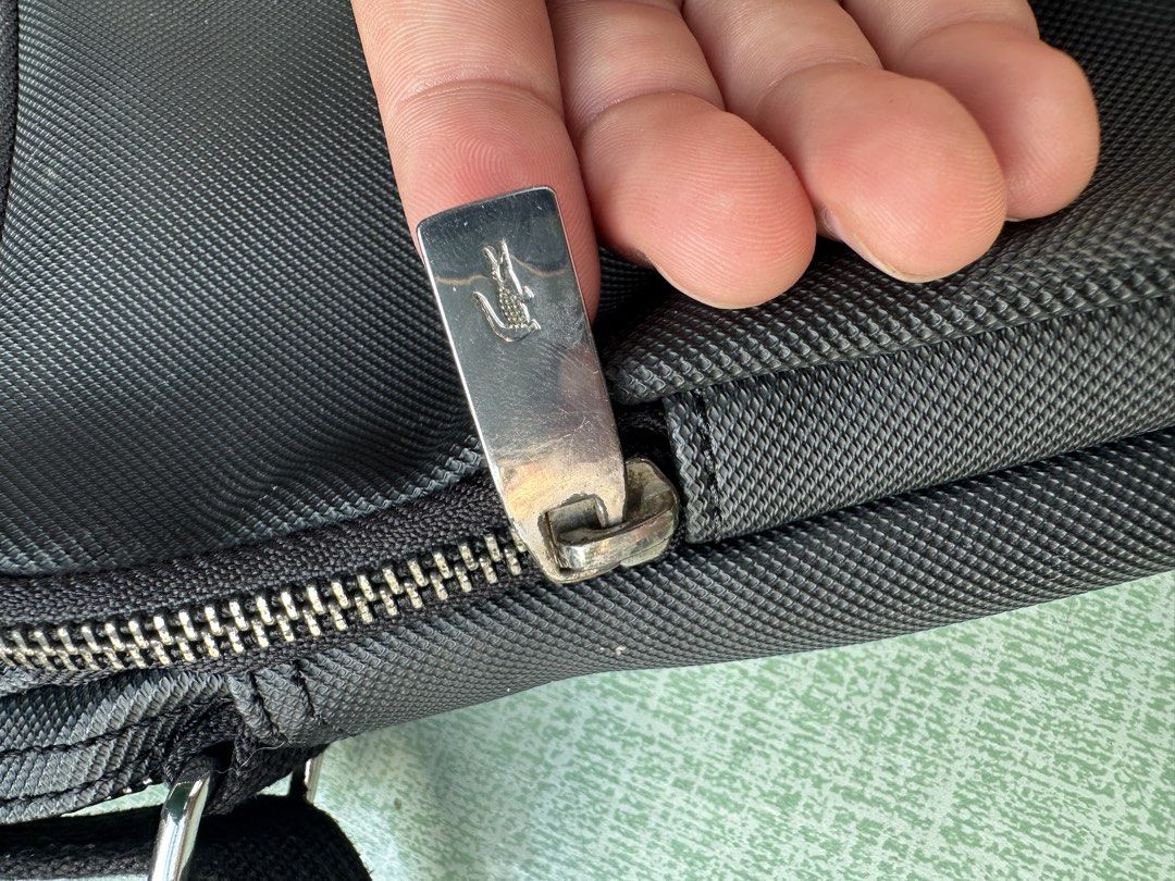 Lacoste Sling Bag (Category: Sling Bags) located in Malabon City. Submitted by denzhamor (Listing ID 1469241058, Image 3). Description: Lacoste Messenger Bag .