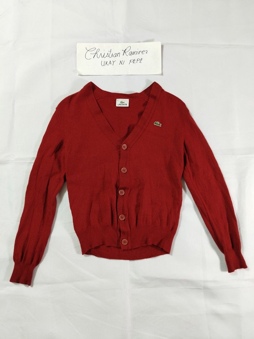 Lacoste wool cardigan (Category: Coats, Jackets and Outerwear) located in Bocaue. Submitted by ukaynipepe (Listing ID 1469320641, Image 1). Description: Lacoste cardigan (red) Size 3 on tag Wool 🧶 Width 16 Length 20.5 No flaws.