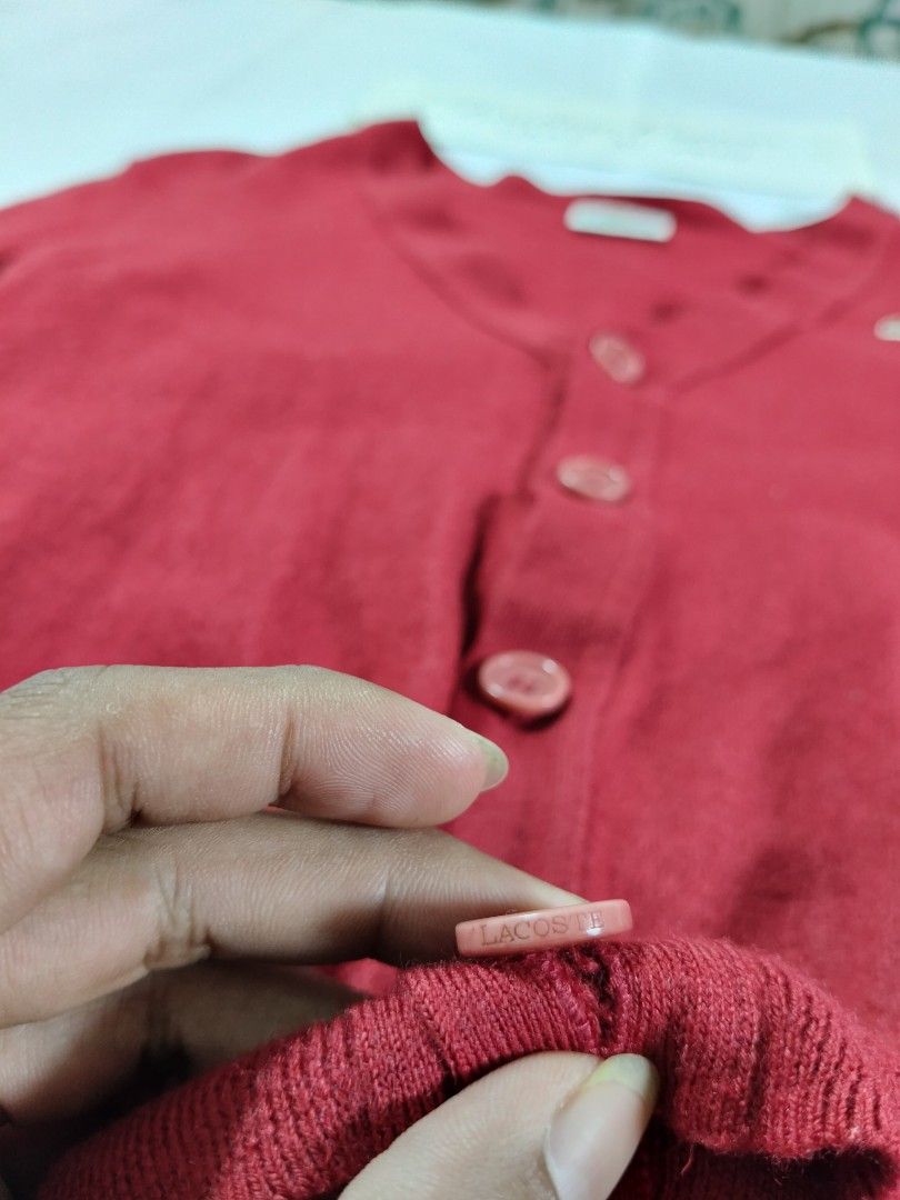 Lacoste wool cardigan (Category: Coats, Jackets and Outerwear) located in Bocaue. Submitted by ukaynipepe (Listing ID 1469320641, Image 3). Description: Lacoste cardigan (red) Size 3 on tag Wool 🧶 Width 16 Length 20.5 No flaws.