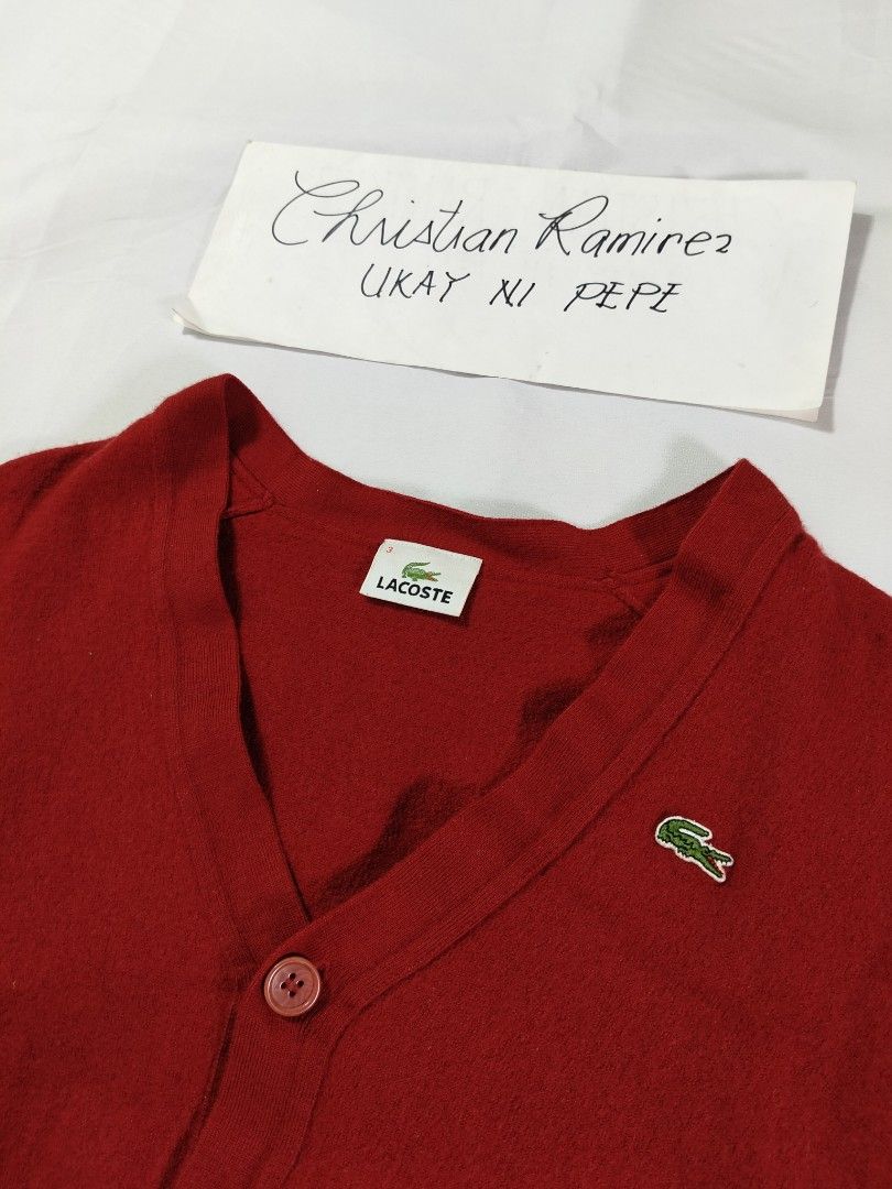 Lacoste wool cardigan (Category: Coats, Jackets and Outerwear) located in Bocaue. Submitted by ukaynipepe (Listing ID 1469320641, Image 2). Description: Lacoste cardigan (red) Size 3 on tag Wool 🧶 Width 16 Length 20.5 No flaws.