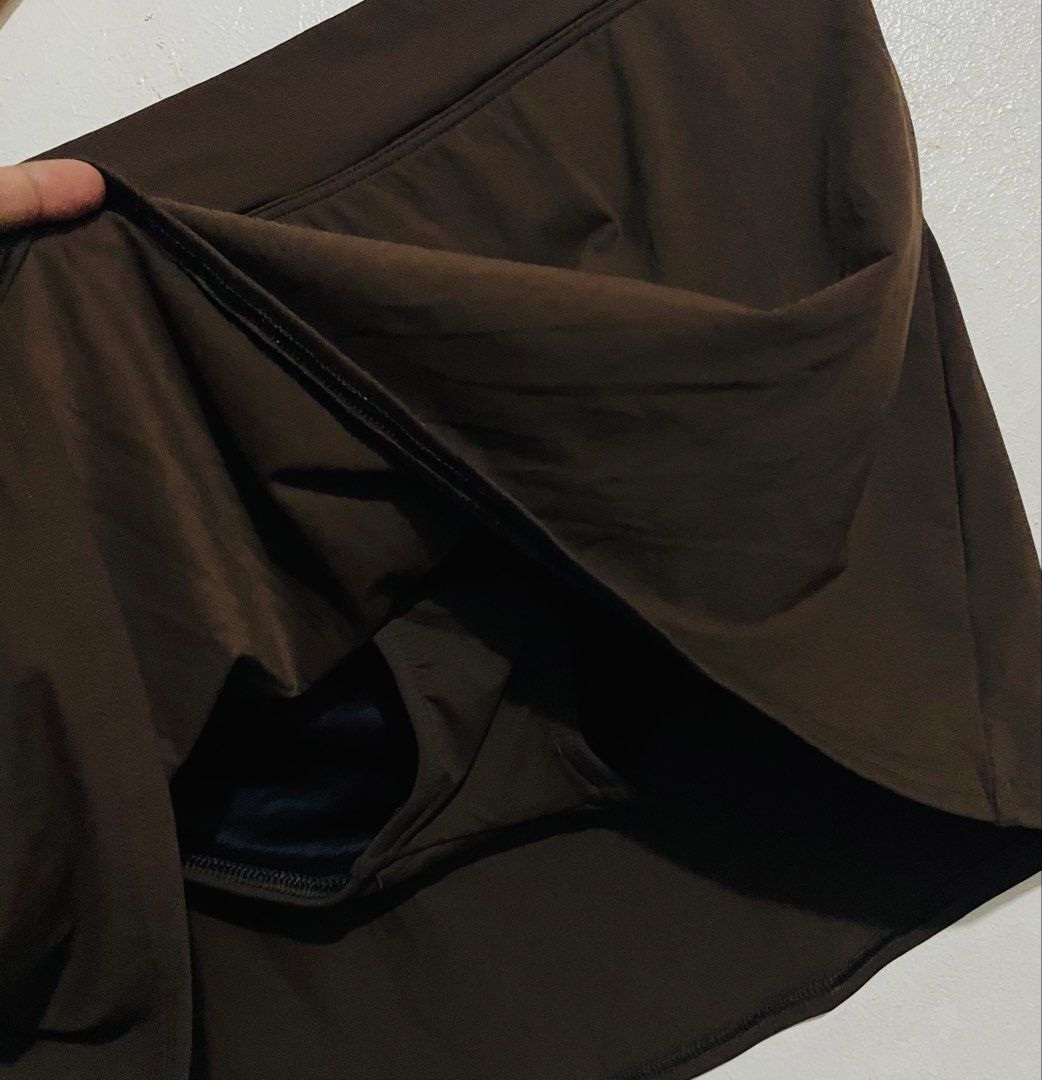 Lands' End Brown Skort (Category: Skirts) located in Caloocan City. Submitted by lovemyclothes21 (Listing ID 1469266336, Image 2). Description: - Brand/Model: Lands' End - Size: 12 - Color: Solid brown - Coverage: Built-in swim bottoms underneath for a secure fit - Design: Flattering high waistband - Material: 80% nylon, 20% spandex/elasthan - Care Instructions: Hand wash cold - Ideal for: Beach trips, pool days, and water sports.