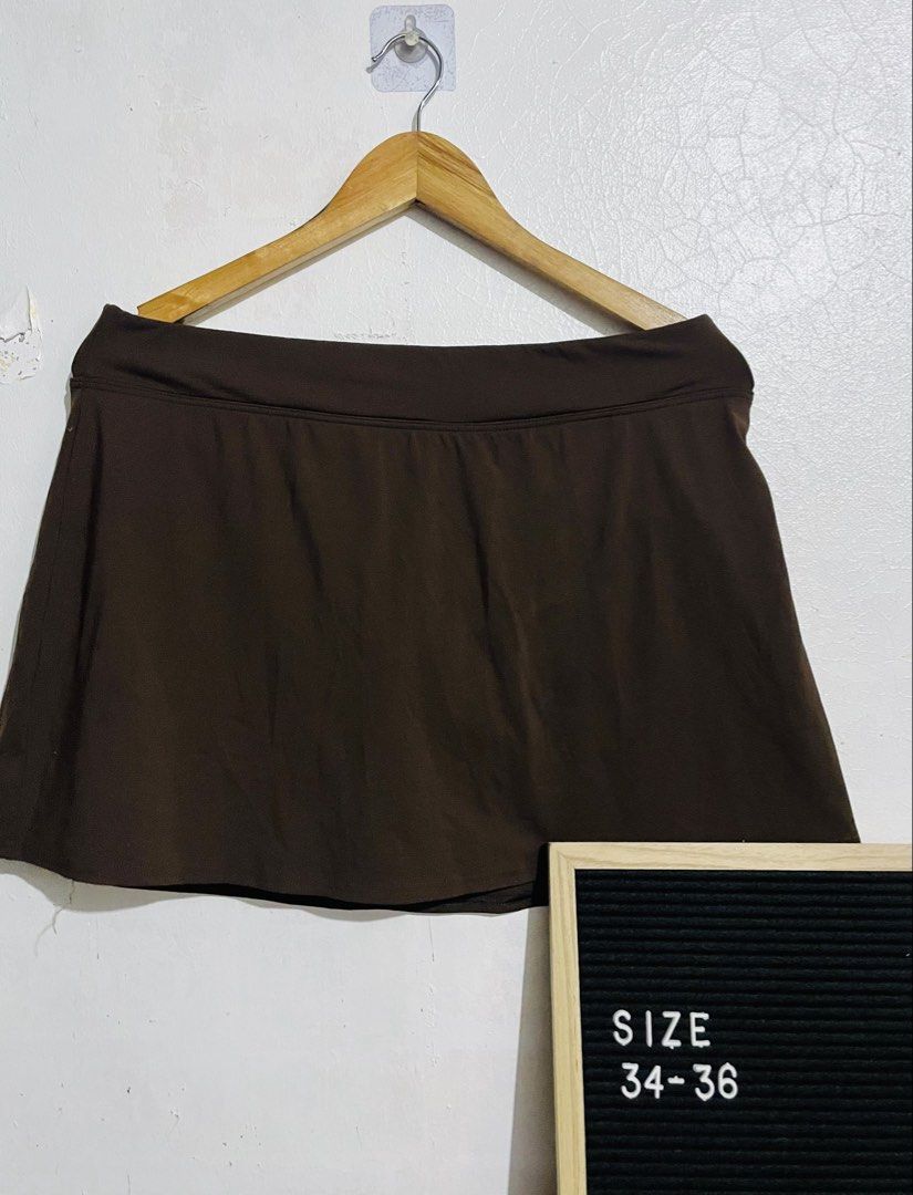 Lands' End Brown Skort (Category: Skirts) located in Caloocan City. Submitted by lovemyclothes21 (Listing ID 1469266336, Image 1). Description: - Brand/Model: Lands' End - Size: 12 - Color: Solid brown - Coverage: Built-in swim bottoms underneath for a secure fit - Design: Flattering high waistband - Material: 80% nylon, 20% spandex/elasthan - Care Instructions: Hand wash cold - Ideal for: Beach trips, pool days, and water sports.