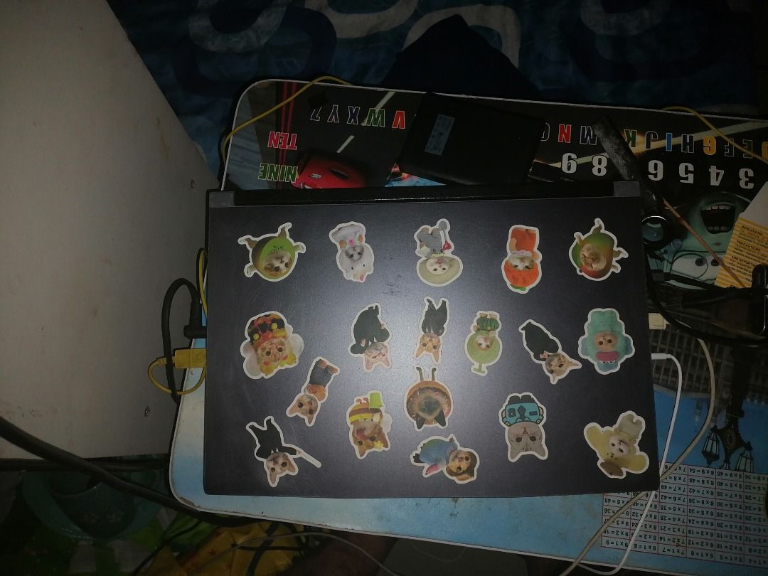 MSI thin 15 b12uc (Category: Laptops & Notebooks) located in Caloocan City. Submitted by freelion-91bb (Listing ID 1469230866, Image 2). Description: - Operating System: Windows 11 - Condition: Used with visible exterior cartoon animal stickers - Keyboard: Backlit keys - Display & Camera: Shows system info; features an integrated webcam - Color: Black Specs i5 12th gen Rtx 3050 40gb ram, 32gb and 8gb ddr4 2tb (1tb nvme m2, 1tb hdd) Batery 40wh pa
