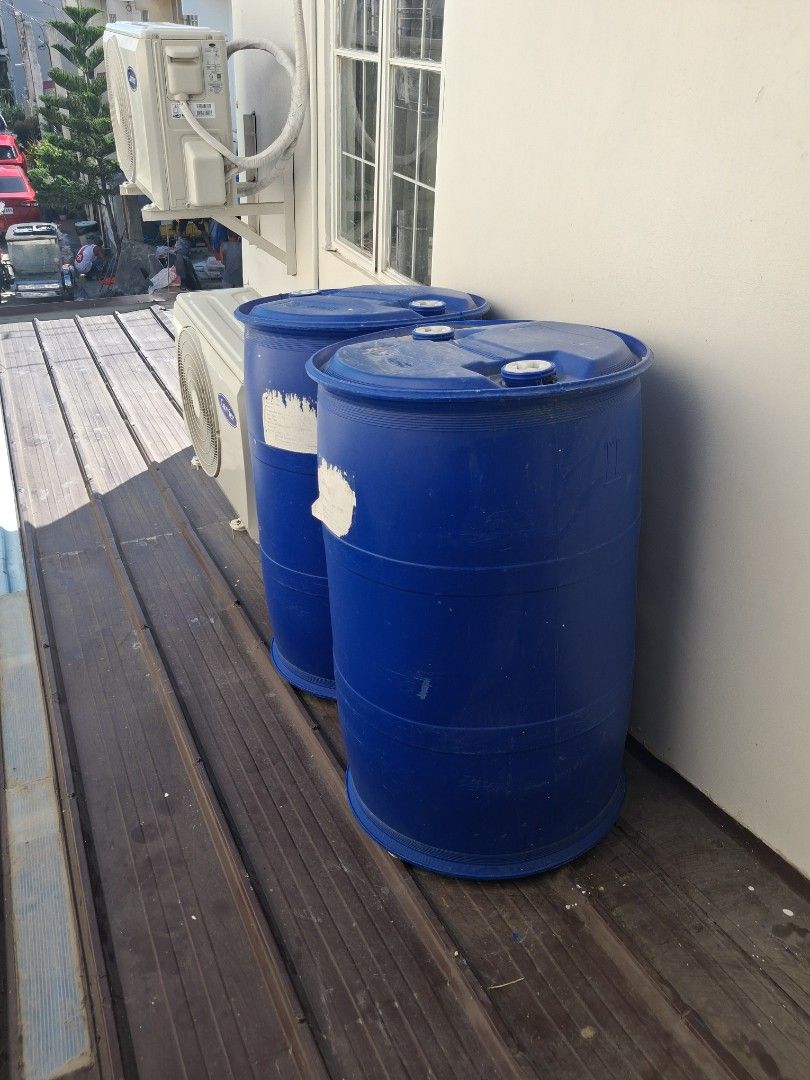 Large Blue Plastic Drums Water Storage Containers (Category: Storage Boxes & Baskets) located in Marikina City. Submitted by livemountain_f541ec (Listing ID 1469166976, Image 1). Description: - Quantity: 2 large blue plastic drums - Design: Heavy-duty construction with dual bung caps for easy filling/pouring - Features: White label patch on the side - Ideal Use: Great for rainwater harvesting or general storage - Condition: Stored outside against