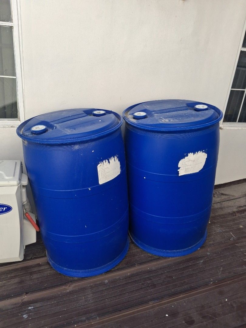 Large Blue Plastic Drums Water Storage Containers (Category: Storage Boxes & Baskets) located in Marikina City. Submitted by livemountain_f541ec (Listing ID 1469166976, Image 2). Description: - Quantity: 2 large blue plastic drums - Design: Heavy-duty construction with dual bung caps for easy filling/pouring - Features: White label patch on the side - Ideal Use: Great for rainwater harvesting or general storage - Condition: Stored outside against