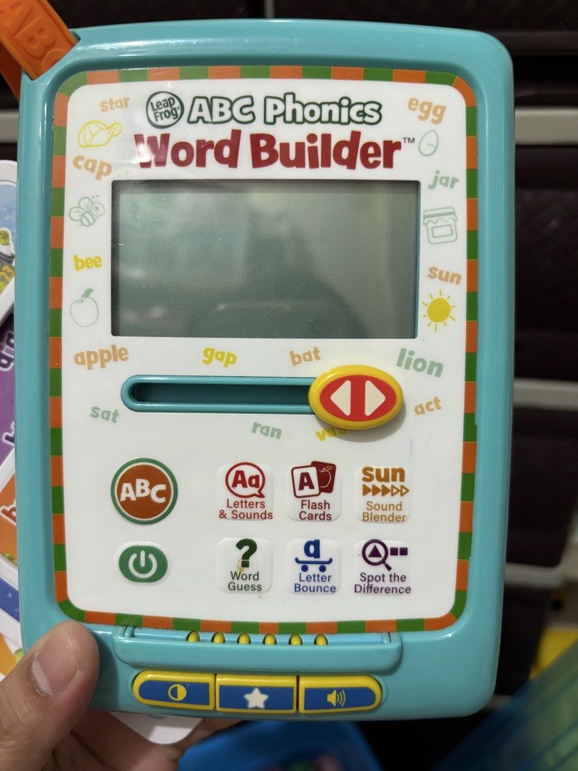 LeapFrog ABC Phonics Word Builder with Cards (Category: Educational & Learning Toys) located in Makati City. Submitted by jhonnared (Listing ID 1469173976, Image 3). Description: - LeapFrog ABC Phonics Word Builder educational toy - Interactive screen with letter sound buttons and slider mechanism - Includes multiple colorful letter and word cards (as shown in photos) - Perfect for toddlers and kids learning to read and spell - Clean unit, fully 