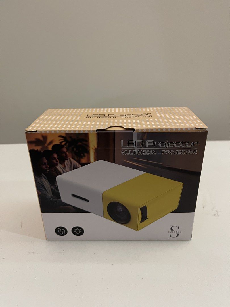 Suertee LED Multimedia Projector White and Yellow in Box (Category: Projectors) located in Pasig City. Submitted by altopentle (Listing ID 1469184515, Image 1). Description: - Brand new: Still in original packaging from storage - Perfect for home movies: Compact Mini LED multimedia projector - Great gift-turned-find: Never used, ready for its first owner - Fun & portable: Ideal for cozy movie nights at home RFS: Surplus/Decluttering. Payment: BDO
