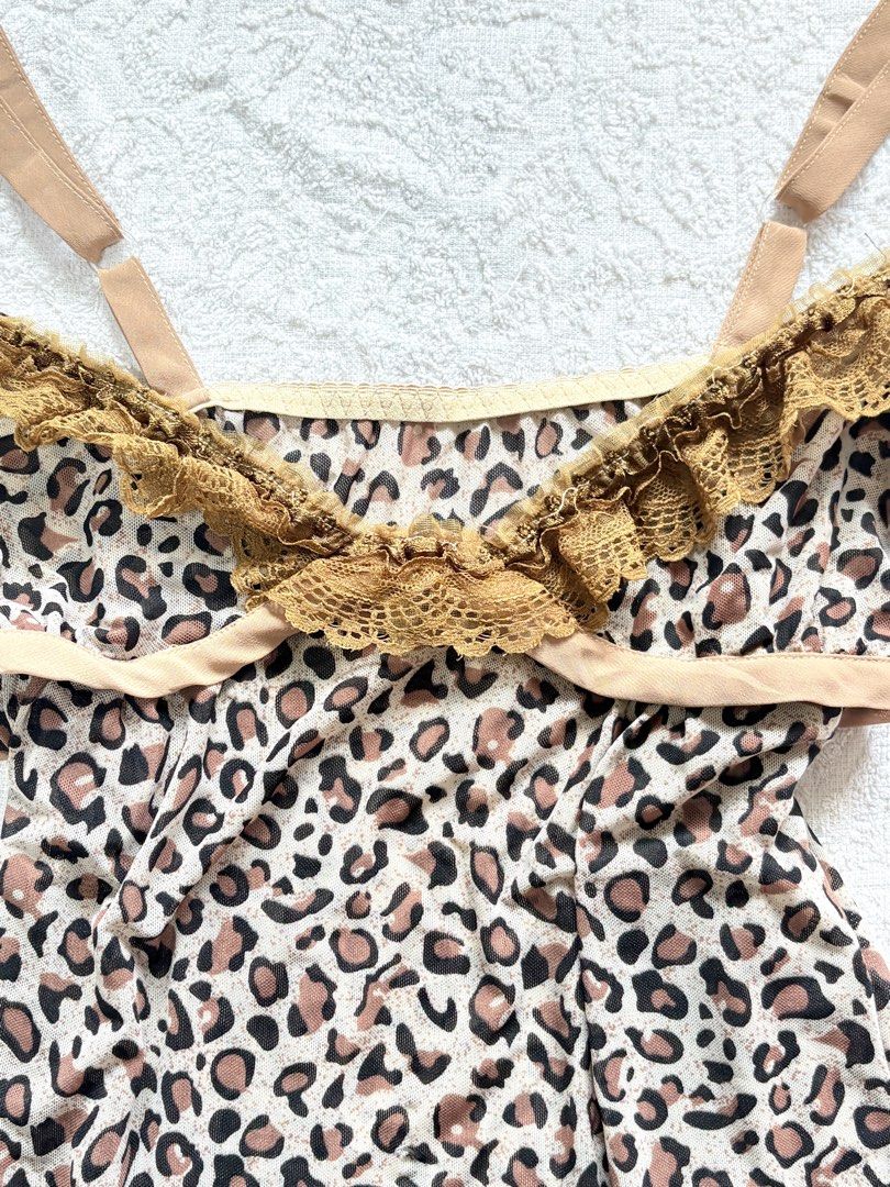 Leopard Print Mesh Camisole with Lace Trim (Category: Sleeveless) located in Butuan. Submitted by saloreia (Listing ID 1469292262, Image 3). Description: ── ⟡ ˙💌 ̟ leopard lace babydoll ‧₊˚ ⋅ leopard print, brown lace & a flared hem ‧₊˚ ⋅ ┆ ⤿ brand : none ┆ ⤿ size : XS–M* 🪷 condition .ᐟ: check last pic for issue .
