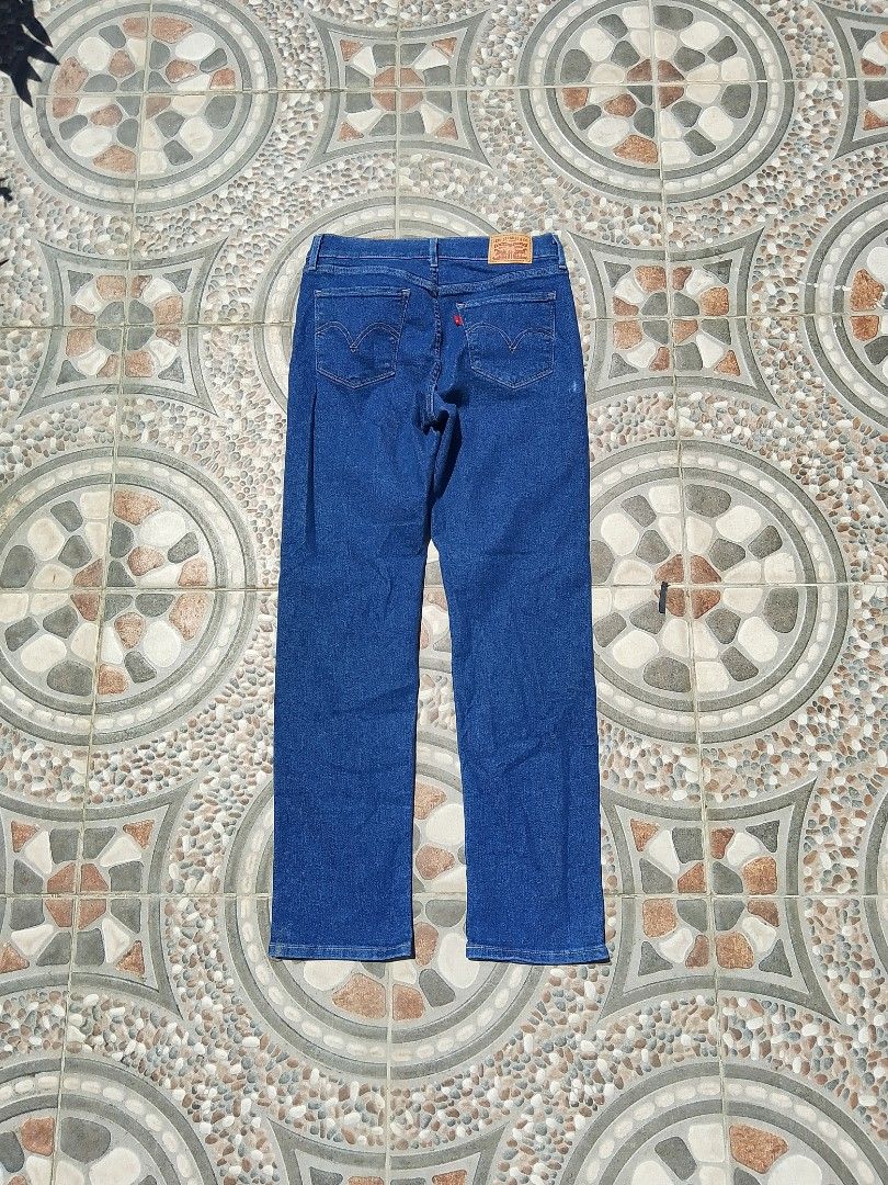 Levi Strauss & Co. Blue Jeans W27 L30 (Category: Jeans) located in Cabuyao City. Submitted by kyokiiiiiii (Listing ID 1469265307, Image 1). Description: - Brand: Levi Strauss & Co. - Color: Classic dark wash blue - Size: W27 L30 (inner tag) - Fit: Straight leg cut - Details: Iconic two-horse leather patch and contrast stitching - Style: Standard five-pocket design.