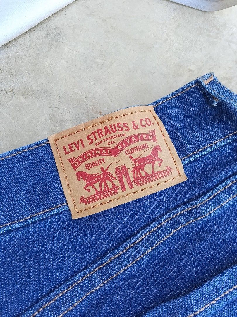 Levi Strauss & Co. Blue Jeans W27 L30 (Category: Jeans) located in Cabuyao City. Submitted by kyokiiiiiii (Listing ID 1469265307, Image 3). Description: - Brand: Levi Strauss & Co. - Color: Classic dark wash blue - Size: W27 L30 (inner tag) - Fit: Straight leg cut - Details: Iconic two-horse leather patch and contrast stitching - Style: Standard five-pocket design.