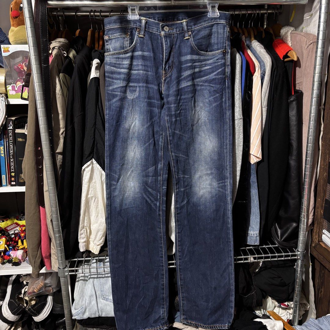 Levi's 502 Regular Taper Jeans W32 L34 (Category: Jeans) located in Caloocan City. Submitted by bonsatocha43876 (Listing ID 1469326660, Image 3). Description: - Brand: Levi's - Style: 502 Regular Taper - Size: W32 L34 - Wash: Dark wash with factory fading and whiskering - Closure: Button fly - Details: Classic 5-pocket setup, leather patch, printed inner pocket bags with Levi's history - Condition: Excellent / Well-maintained - Message for more d
