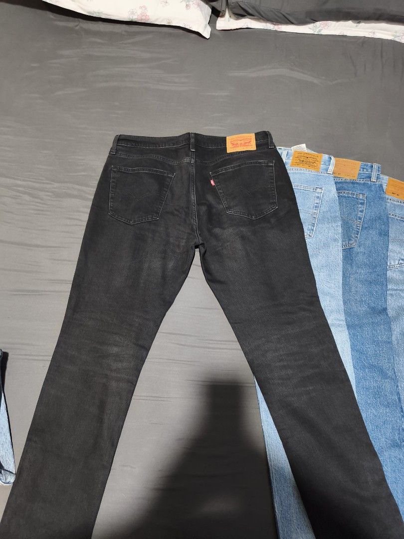Levi's 511 Slim Fit Jeans Black W36 L32 (Category: Jeans) located in San Juan City. Submitted by thrsdy (Listing ID 1469288564, Image 2). Description: - Brand/Model: Levi's 511 Slim Fit Jeans - Color/Wash: Black - Size: W36 L32 - Details: Classic leather patch on back waistband, standard five-pocket styling, zip fly - Condition: Great everyday denim piece, ready to wear.