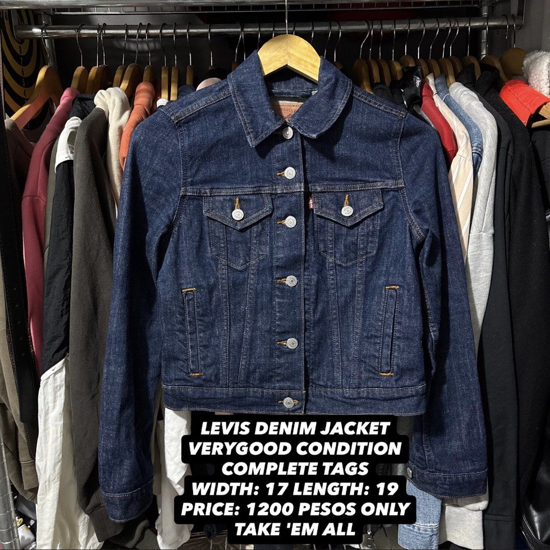 Levi's Denim Jacket Size XS (Category: Coats, Jackets and Outerwear) located in Caloocan City. Submitted by bonsatocha43876 (Listing ID 1469322577, Image 1). Description: - Brand: Levi's - Color/Wash: Dark wash denim - Size: XS (tag on inner collar) - Dimensions: 17" width, 19" length - Features: Classic button-up front, dual chest pockets, and side pockets - Condition: Great staple piece for layering, complete with inner laundry tags.