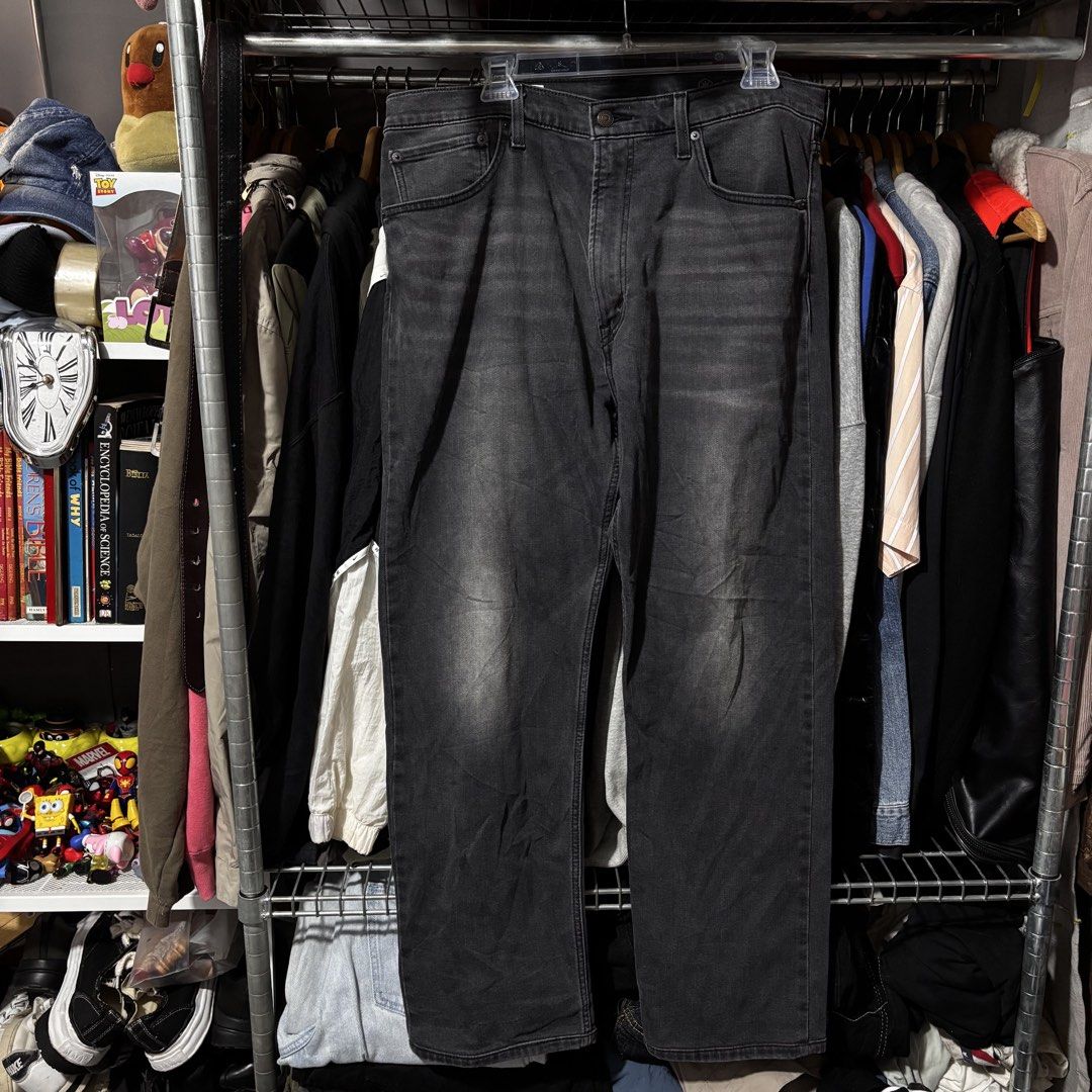 Levi's Denim Washed Black Jeans (Category: Jeans) located in Caloocan City. Submitted by bonsatocha43876 (Listing ID 1469327006, Image 2). Description: - Brand: Levi's - Color: Washed black - Fit: Relaxed through thighs with a classic straight leg - Waist: Mid rise with standard button and zipper fly - Pockets: Classic five-pocket styling with unique history print graphics inside - Details: Signature back pocket stitching and black leather back w