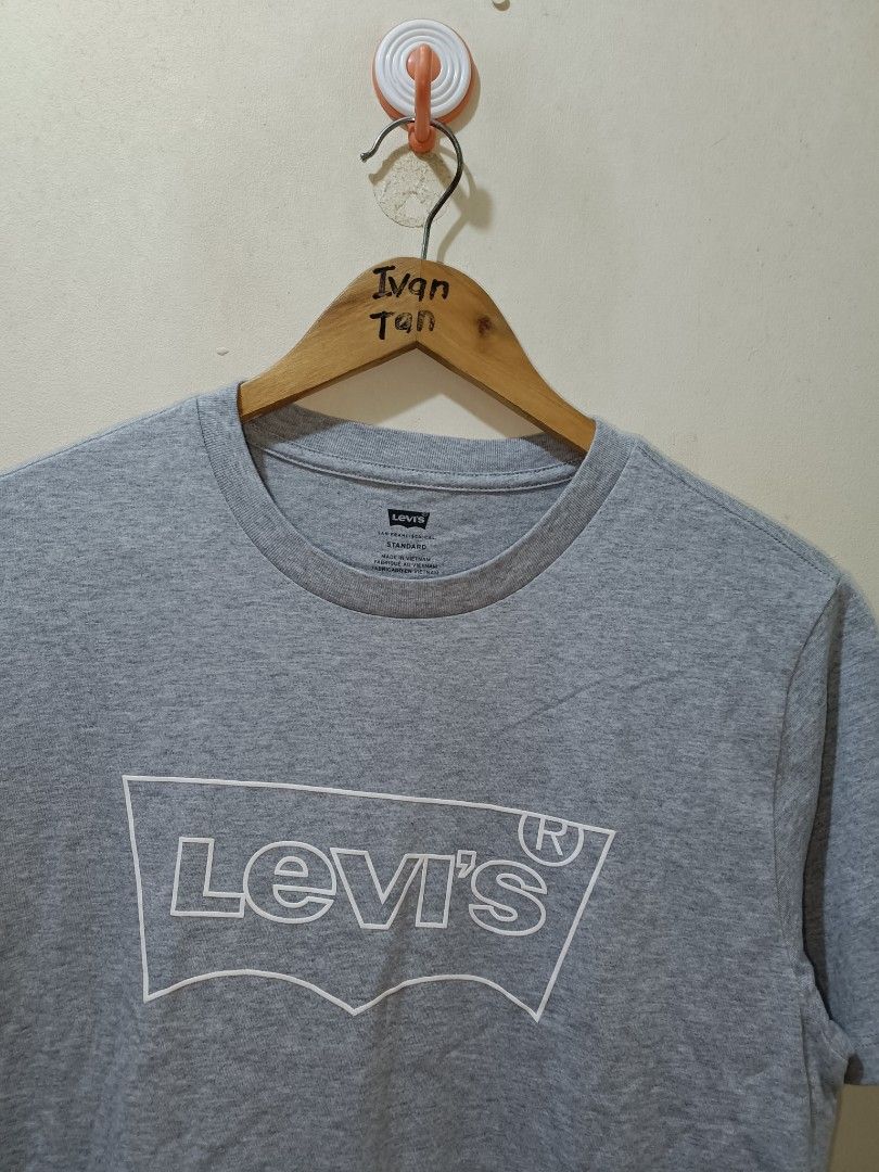 Levi's Grey Graphic T-Shirt Size S (Category: Tshirts & Polo Shirts ) located in Makati City. Submitted by ivsseyow03 (Listing ID 1469278940, Image 2). Description: Grey Levi's t-shirt with large outline logo on the front. Standard crew neck style with short sleeves. Tag says size S, measurements 165/84A. Made in Vietnam. Comfortable cotton fabric, easy to match with jeans or shorts for daily wear..