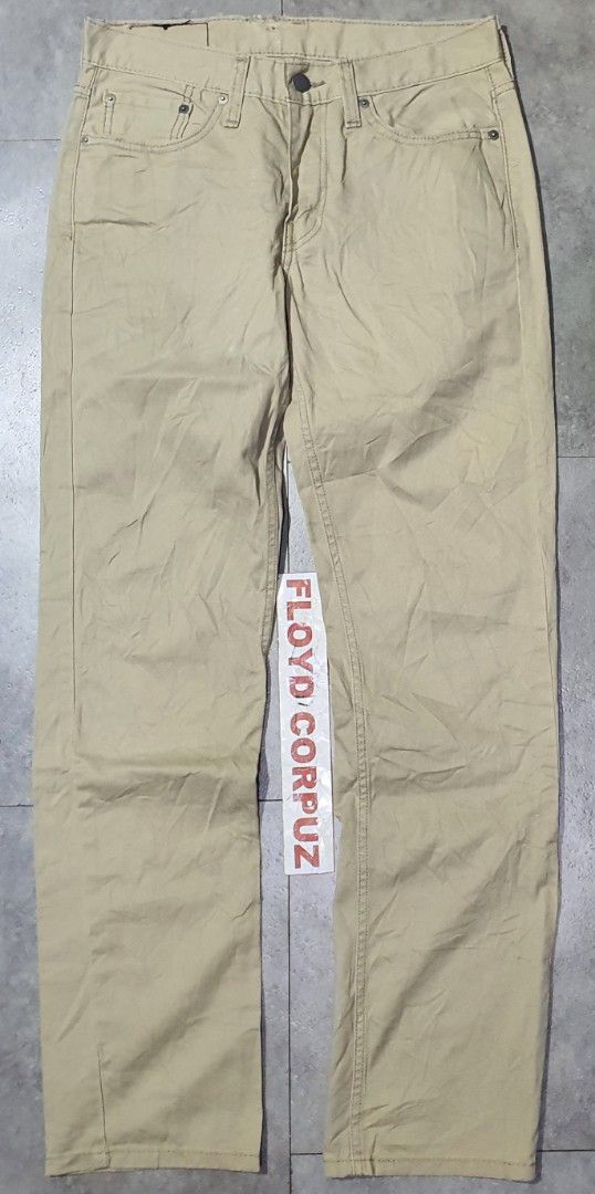Levi's Khaki Pants W29 L32 (Category: Jeans) located in Laoag. Submitted by floydg_corpuz22 (Listing ID 1469257804, Image 1). Description: Levi's Waterless khaki pants in size W29 L32. Features a classic straight cut, button fly, and a versatile tan color. Has minor wear near the waistband as shown in photos. Levis 28 to 30 x 29 Leg opening 7. 5 Vgood to excellent see issue sa pic 380+sf.