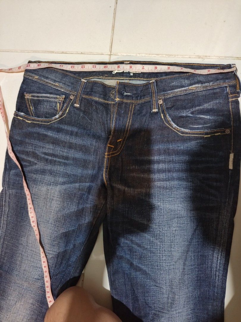 Levi's San Francisco Denim Jeans Size 28 (Category: Jeans) located in Davao. Submitted by romelyap (Listing ID 1469180621, Image 3). Description: - Brand: Levi's San Francisco - Style: Straight leg denim jeans - Color/Wash: Dark blue wash - Size: Tagged size 28 (inner waistband) - Details: Classic five-pocket setup, contrast stitching, branded hardware - Accents: Signature back pocket arcuate stitching and iconic red tab - Condition: Solid everyd