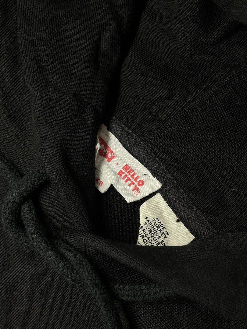 LEVIS X HELLO KITTY CLASSIC LOGO BLACK HOODIE (Category: Coats, Jackets and Outerwear) located in Pasay City. Submitted by digital_wardrobe.ph (Listing ID 1469180125, Image 3). Description: LEVIS X HELLO KITTY CLASSIC LOGO BLACK HOODIE details size: xs - large width: 24 length: 27 price: 650 location: pasay city.