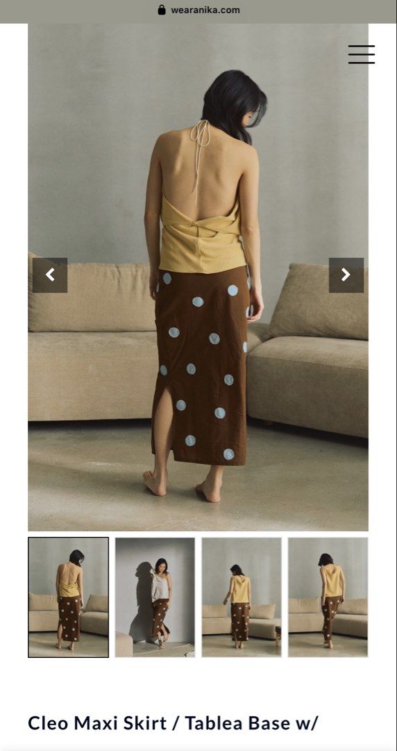 LF: WEAR ANIKA (size M) (Category: Skirts) located in Paranaque City. Submitted by declutterwyae (Listing ID 1469260141, Image 3). Description: - Brand/Style: Anika Arlo midi skirt - Color: Heathered oat and black - Design: Layered paneled design with dark piping along the seams - Fit/Fabric: Structured fabric, mid-length cut - Style: Clean, minimalist aesthetic; great neutral piece for daily rotation.