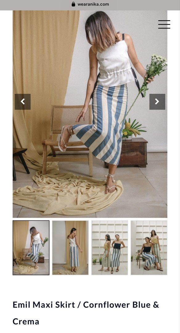 LF: WEAR ANIKA (size M) (Category: Skirts) located in Paranaque City. Submitted by declutterwyae (Listing ID 1469260141, Image 2). Description: - Brand/Style: Anika Arlo midi skirt - Color: Heathered oat and black - Design: Layered paneled design with dark piping along the seams - Fit/Fabric: Structured fabric, mid-length cut - Style: Clean, minimalist aesthetic; great neutral piece for daily rotation.