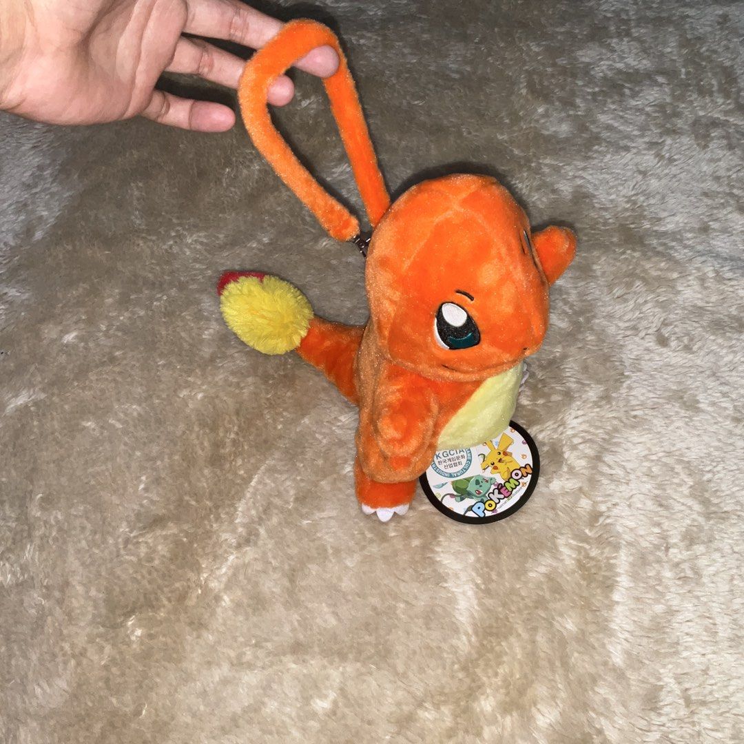 Licensed Pokémon Charmander Pouch Plush Toys (Category: Plushies & Soft Toys) located in San Fernando. Submitted by jz_ofiaza (Listing ID 1469279093, Image 2). Description: Brand New condition .